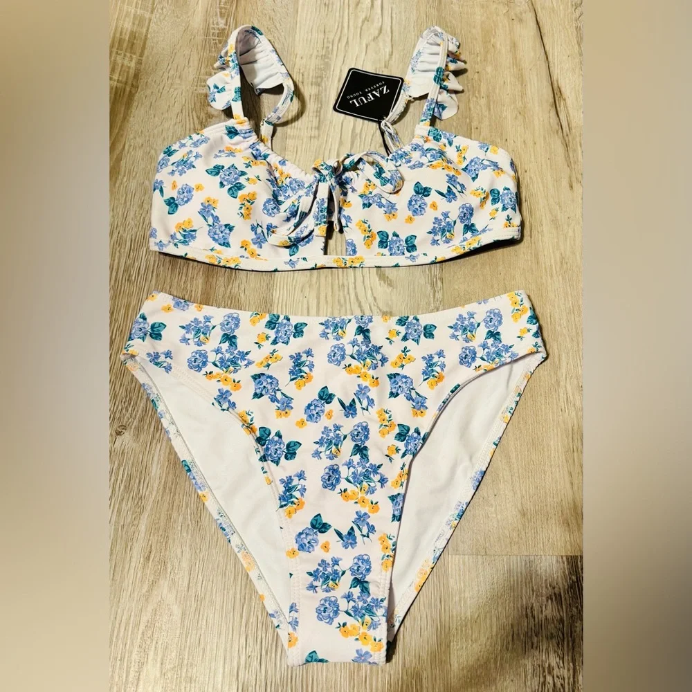 Zaful. This modern women's swimsuit, size S, features a tummy-flattering effect